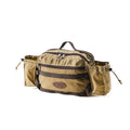 The Back Bay Lumber Pack has several webbed cotton loops for accessories on the front, a heavy duty nylon zipper pocket also on the front, and two side pouches that can be cinched shut for additional storage.