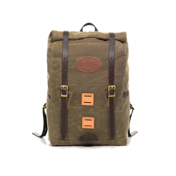 Front view of backpack fully packed to show expansion, and the two front leather lashing squares for additional leather straps to be added.
