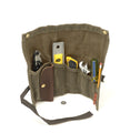 There are multiple pockets to accept different sized tools, and a  leather snap pocket for small items like nails and screws.