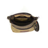 The main compartment is closed by a high quality coiled zipper.