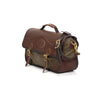 Leather and waxed canvas brief bag with a leather shoulder strap and pad.
