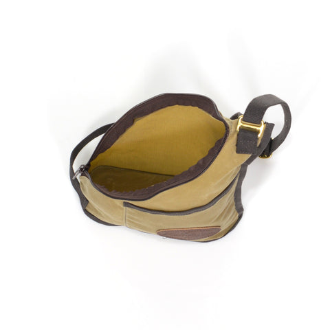 Waxed canvas sling bag made by Frost River Trading Co.