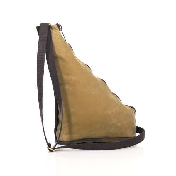 Sturdy webbed cotton shoulder strap with solid brass adjustment piece.
