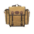 The Cliff Jacobson is a light weight tan colored box style pack. With two leather straps in the front to secure your load. Handcrafted in Duluth, MN.