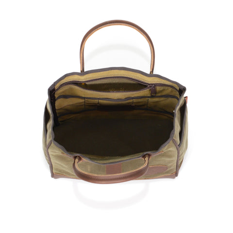 The open interior of this tote has several inside small slip pockets and a large zippered inside pocket.