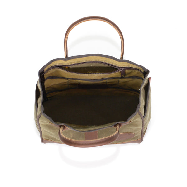 The open interior of this tote has several inside small slip pockets and a large zippered inside pocket.