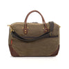 Rear view of the brief bag to show back outside slip pocket and webbed cotton shoulder strap.