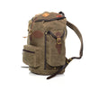 The side pockets on this backpack can hold water bottles and close with a quick flap and leather strap design.
