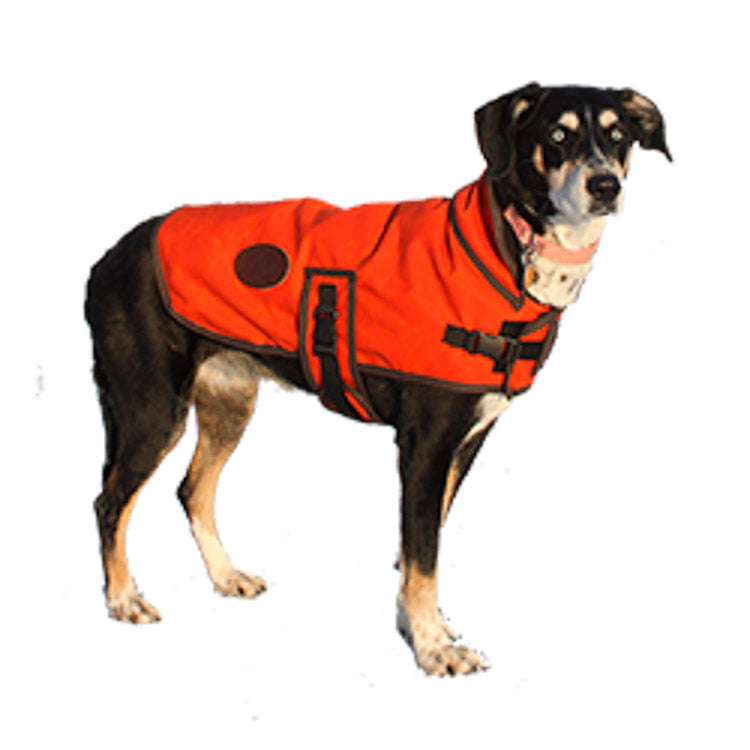 Dog vest made with water resistant waxed canvas and lined with canton flannel.