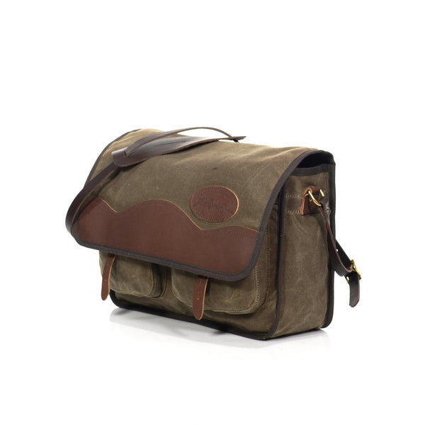 A premium leather shoulder strap, leather shoulder pad, and reinforced by two solid brass attachment points, this bag will go anywhere you can go.