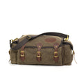 The Frost River Tackle Box is a soft sided tackle box made from durable waxed canvas and full grain leather.
