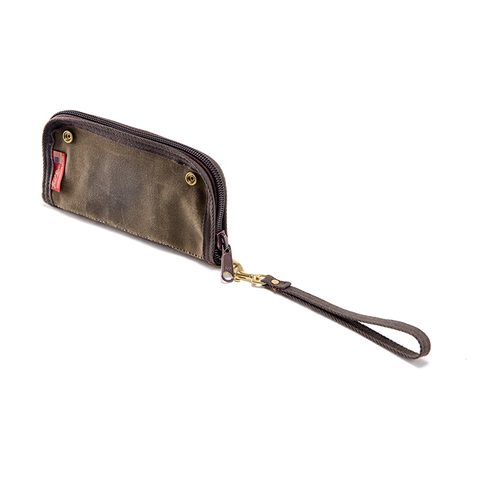 Two solid brass snaps are on the back to attach to some of our totes. Materials sourced within the USA, handcrafted in Duluth MN, and made by Frost River Trading Co. 
